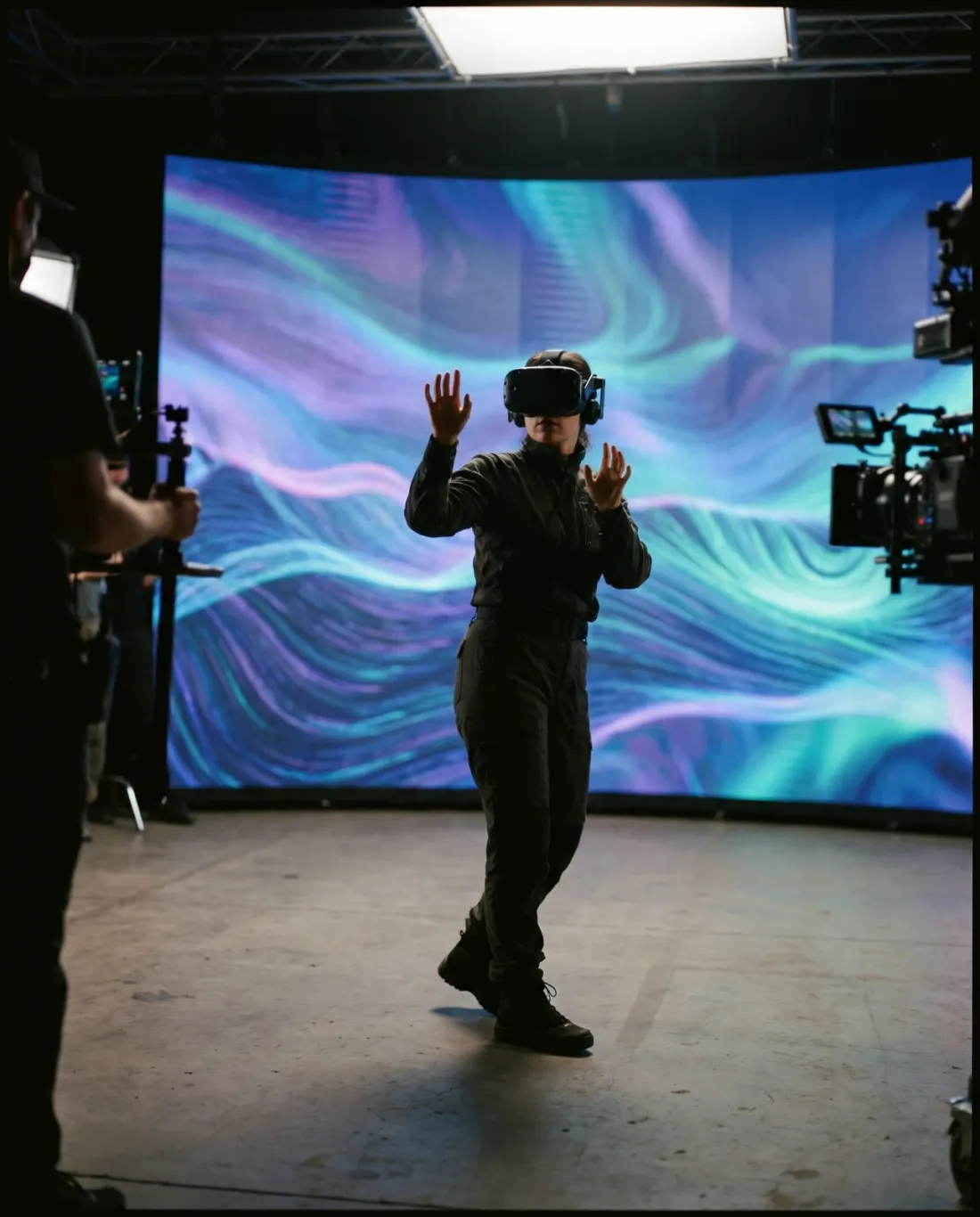 Performer in a VR headset inside an LED volume studio