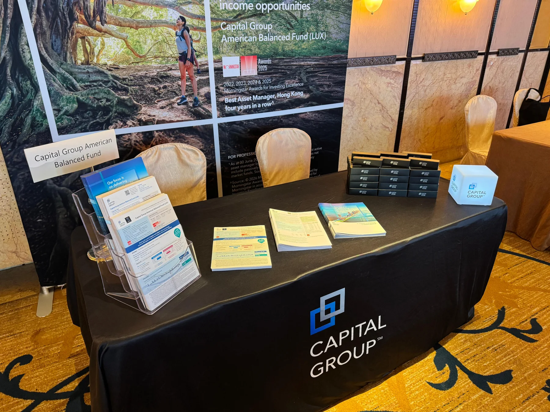 Branded gifts and printed materials prepared at a display table