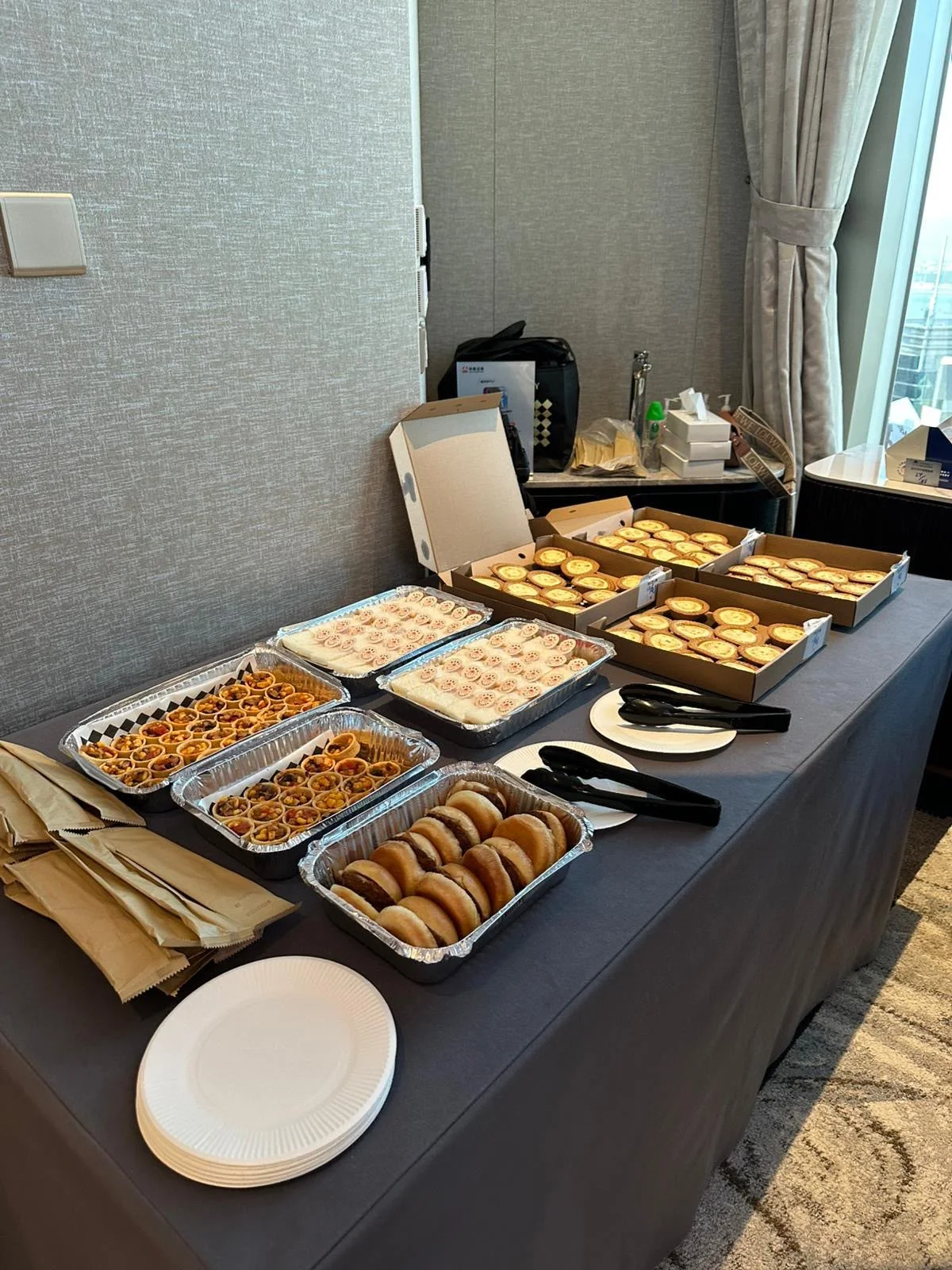 A seminar buffet with pastries, sandwiches and savoury refreshments